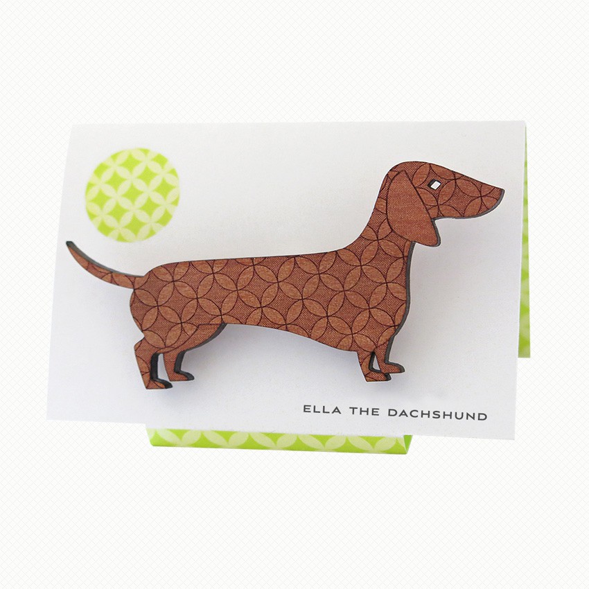 Ella the Dachshund brooch in Tasmanian myrtle Sausage Dog brooch in Tasmanian Myrtle wood with a delicate laser-engraved pattern of overlapping circles.