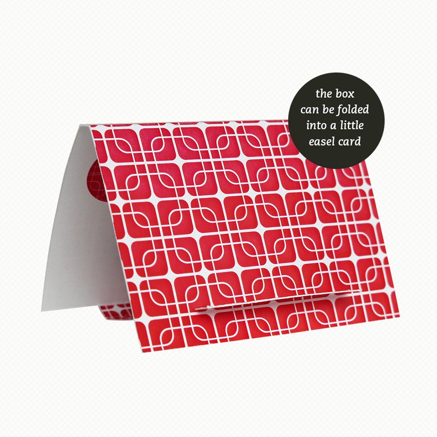 Patterned side of the easel/gift box for my Gridlock patterned brooch The brooch gift box can be folded out into an easel card with a matching retro pattern in deep red and white.