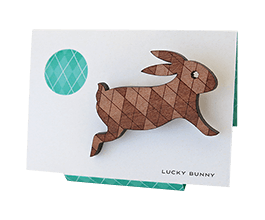 Cute rabbit brooch in Tasmanian Myrtle wood with a delicately laser-engraved retro argyle pattern.