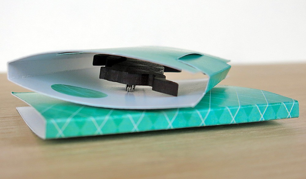 Lucky Bunny brooch gift box folded up The easel stand for my brooches folds into a sweet little gift box with a chic turquoise argyle pattern