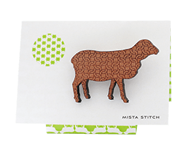 Sheep brooch in Tasmanian Myrtle wood with a delicate laser-engraved chunky knit pattern