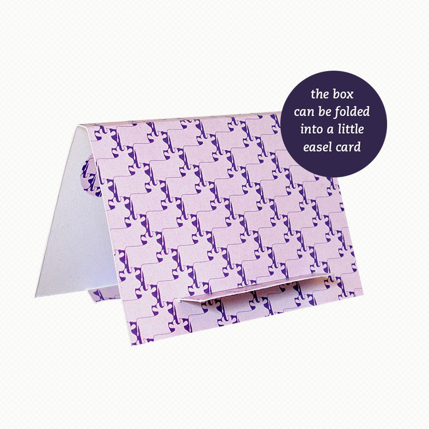 Patterned side of the easel/gift box for my Silly Moo brooch The brooch gift box can be folded out into an easel card with a pattern of overlapping cows