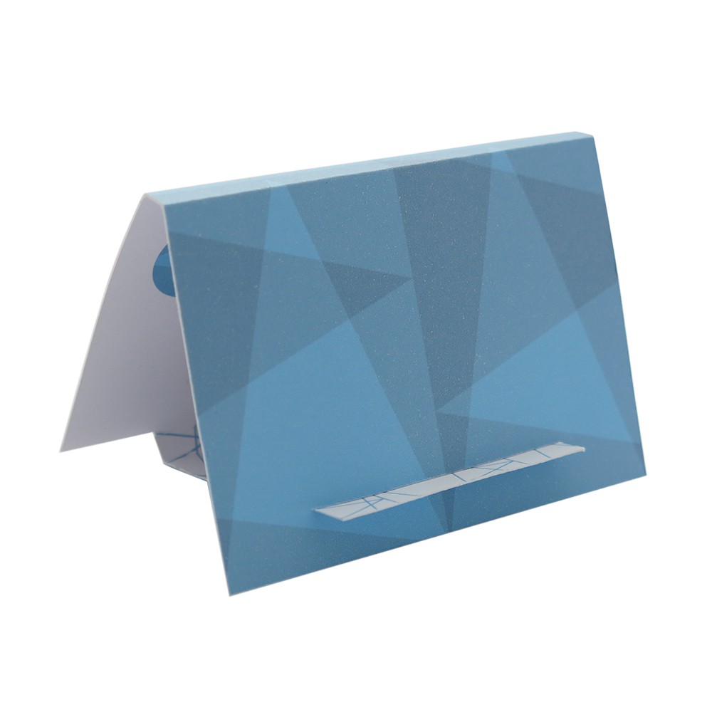 The reverse side of the easel/gift box for my Cuba Dove brooch The brooch gift box can be folded out into an easel card with a matching powdery blue pattern.