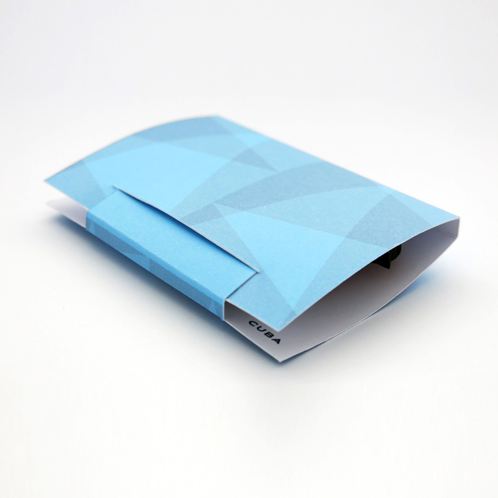 Cuba dove brooch gift box The easel-style stand folds down into a sweet little gift box in a matching powdery blue pattern.