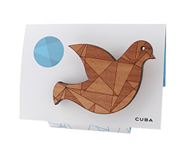 Dove brooch in Tasmanian Myrtle wood veneer with a delicate laser-engraved geometric pattern of overlapping triangles